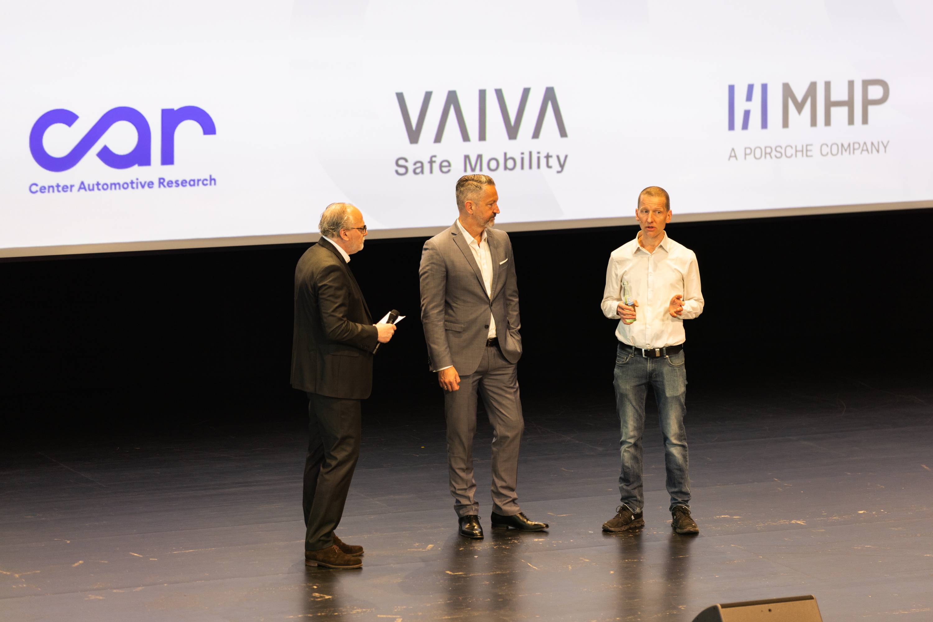 Speakers on stage at CAR IT-Symposium 2026